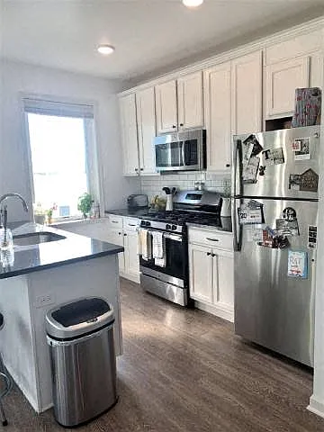 4114 Lauriston Street — Photo 32