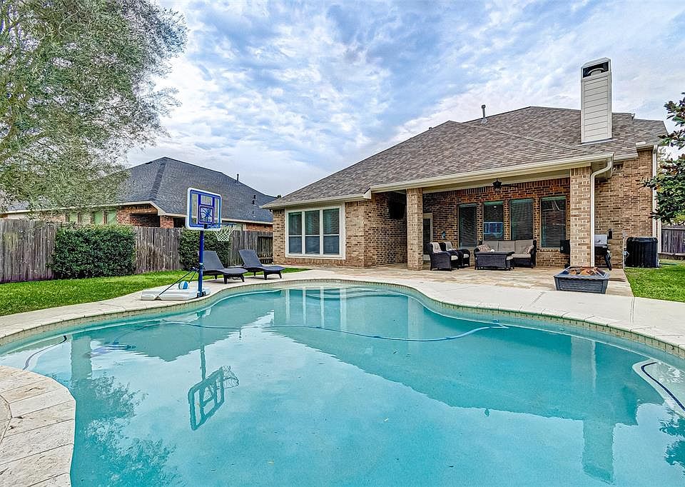 Huge pool with heater/cooler for year round enjoyment - your family & friends will love it! Still yard left over for a family pet or kiddos to run around - but there is a neighborhood pocket park just a short walk away.