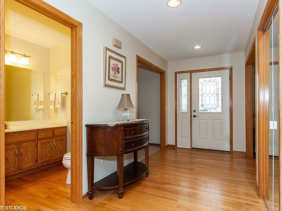 HARDWOOD FLOORS IN ENTRY AND 1/2 BATHROOM.