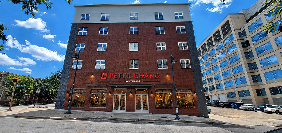 Apartment building featuring the acclaimed Peter Chang restaurant on the first floor_perfect for a quick bite. - 1923 Ashland Ave