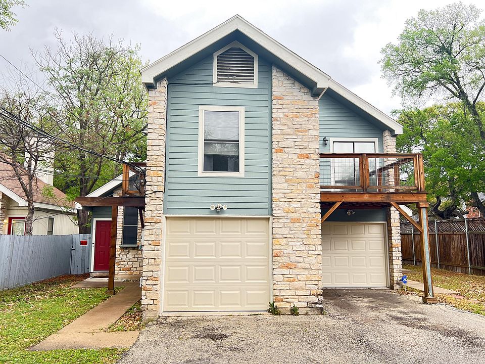 Duplex with unit A on LEFT side. Parking for 2 cars outdoor + 1 garage parking space.