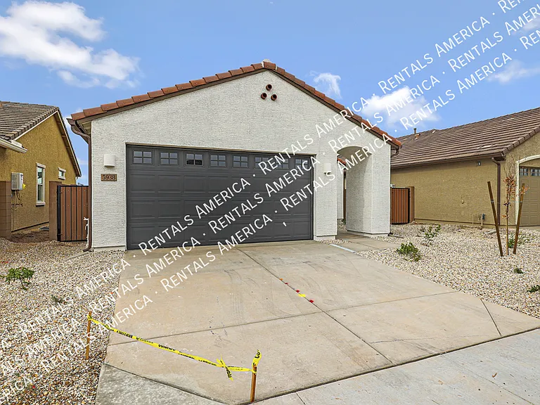 5938 N 90th Dr — Photo 1
