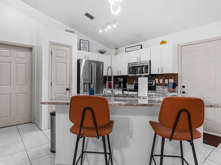 645 NW 65th St — Photo 14