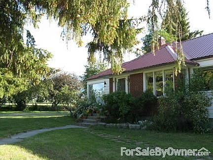 Front of House
						:
						photo is taken from driveway looking southwest