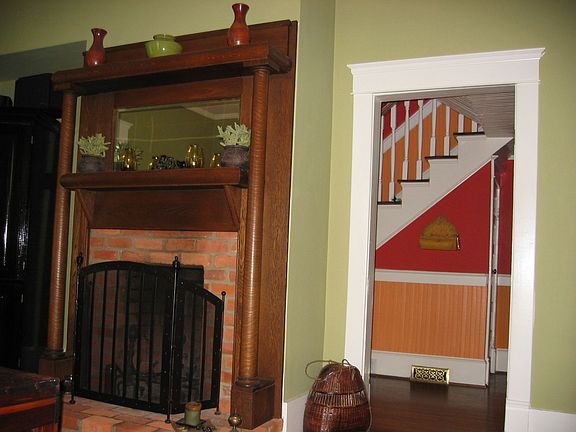 Original fireplace! One of the many details that make house unique.