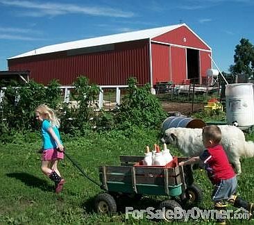 The Kitchen
						:
						Custom built breakfast table included. Soft yellow painted walls.