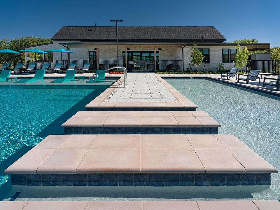 Sundeck near the sparkling pool at parcHAUS at Paloma Creek