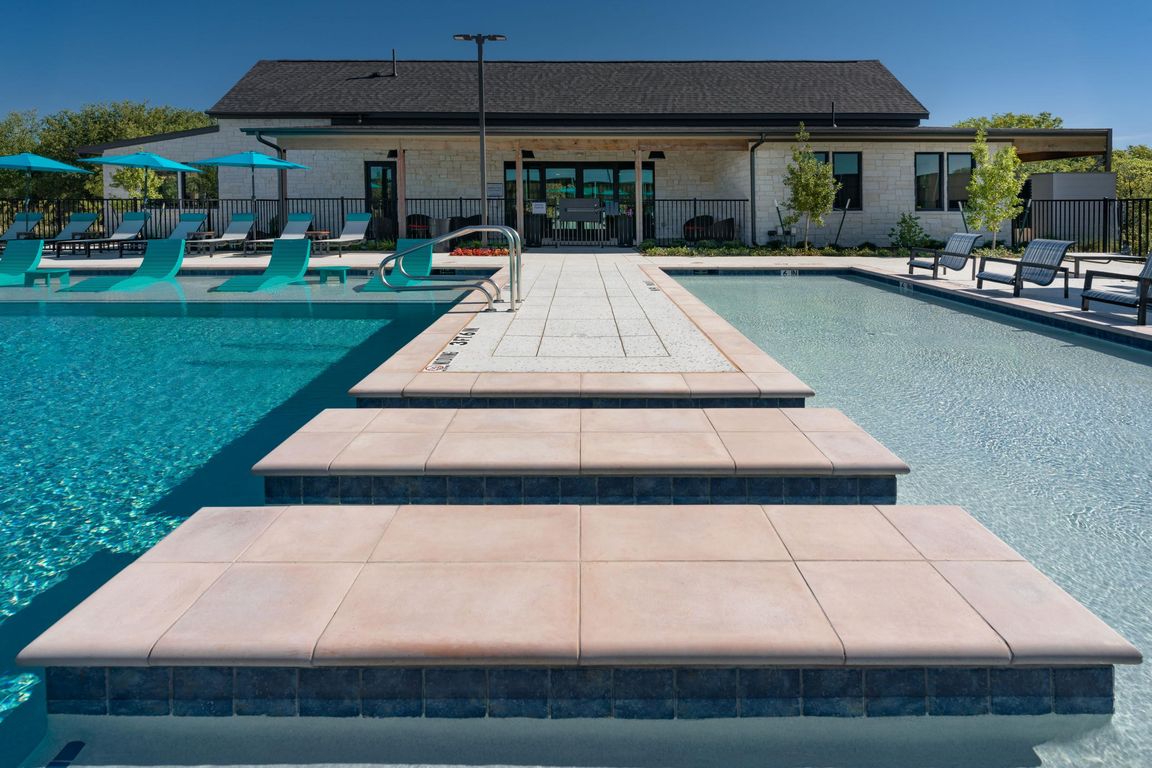 Sundeck near the sparkling pool at parcHAUS at Paloma Creek
