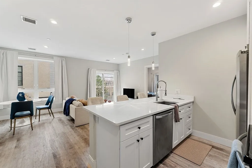 Building Photo - 1457 Tremont St #207