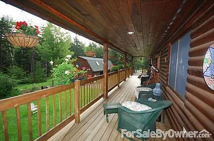 Covered Porch
						:
						Looks out on to the front lawn and garage
