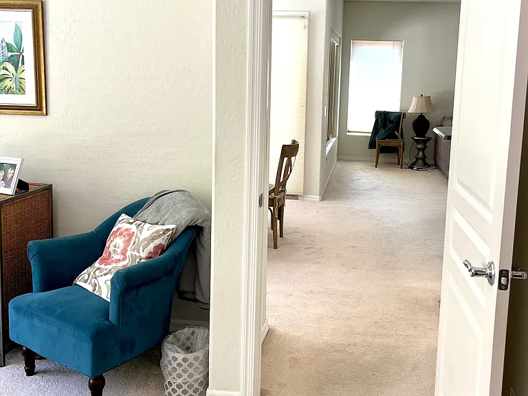 From primary bedroom into kitchen/living area