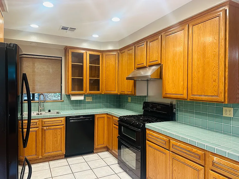 Kitchen - dishwasher, double oven, fridge. Lots of storage, large walk in pantry.