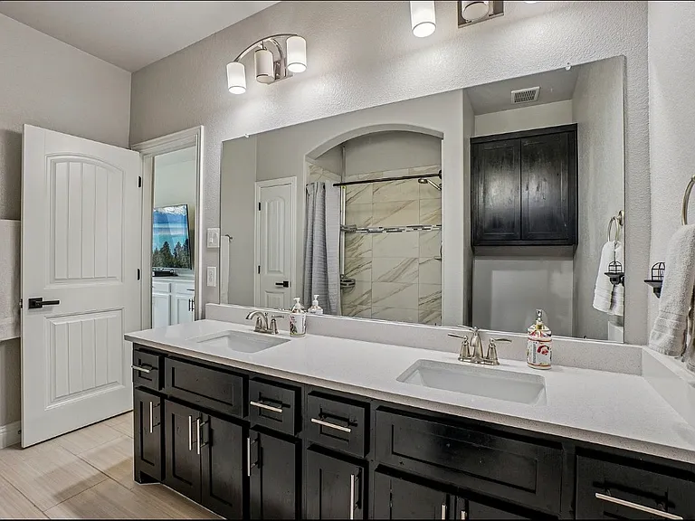 3rd full bathroom. Dual sinks that support the 2 bedrooms on 2nd level.