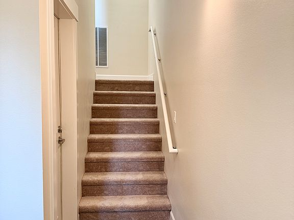 Stairs to go to first floor from the entry door or garage entry door