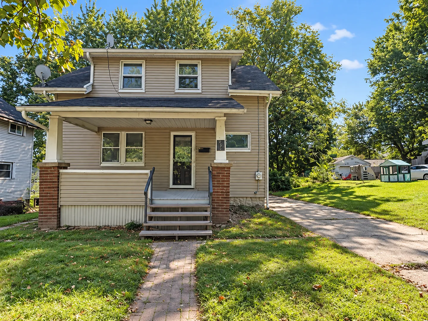 Spacious 3-Bedroom / 1 Bathroom Akron Home with Garage & Basement $1,250/Month — Photo 1