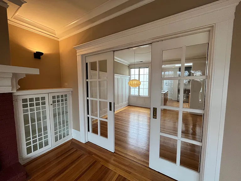 Pocket doors separate living and dining rooms