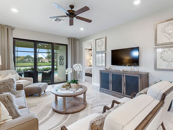 Model Representation Gathering room with sliding glass door to covered lanai