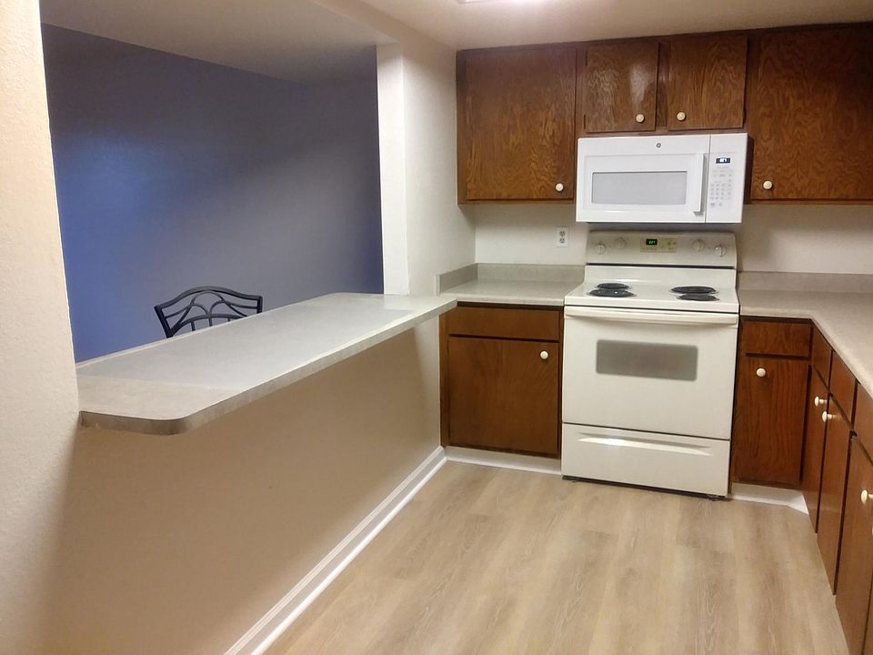 Like new appliances - microwave - self cleaning oven - wood lam flooring