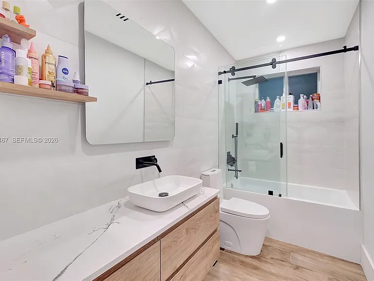 7711 Miami View Dr — Photo 18