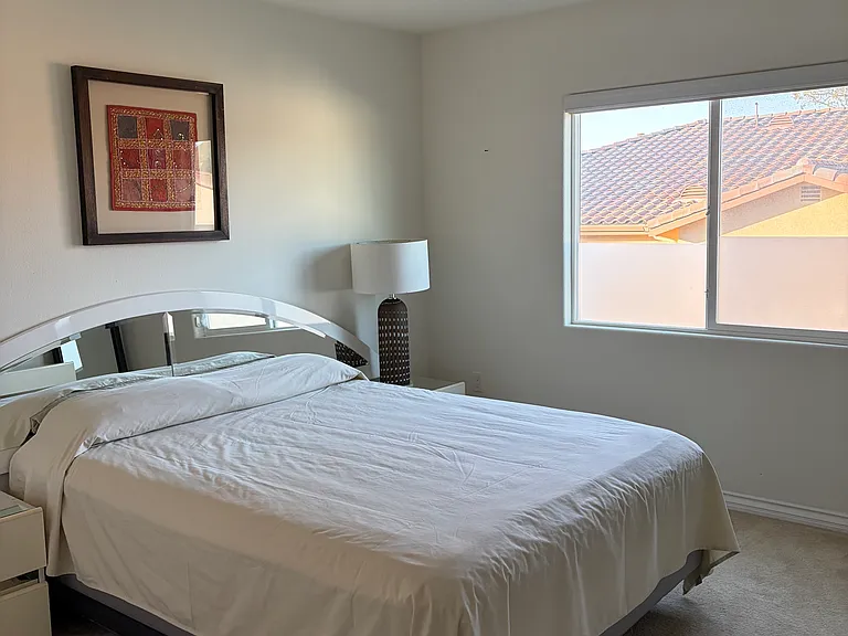 Second bedroom with Samsung 65" TV.