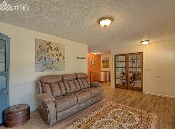 Formal Living Room with adjacent office with french doors