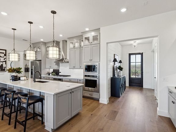 Welcoming entry into spacious kitchen and living areas