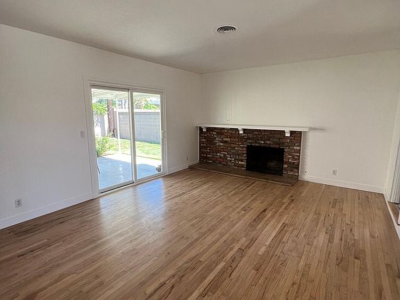 Living room, natural, newly-refinished hardwood floors