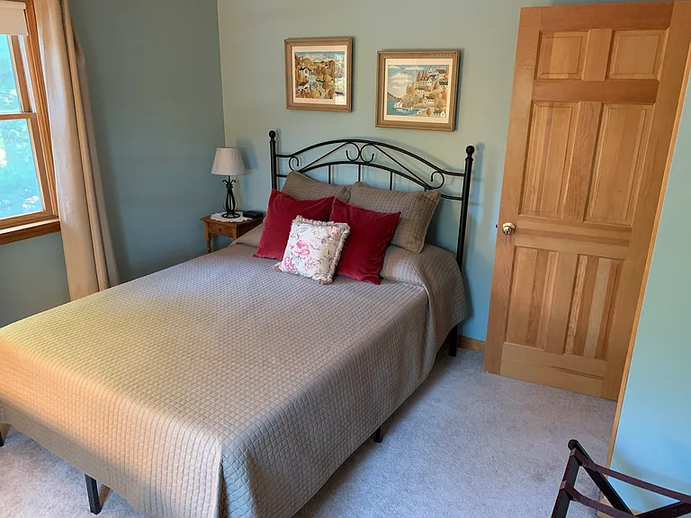 clean, simple, safe upstairs bedroom, queen bed, nightstand, very cozy feel.
