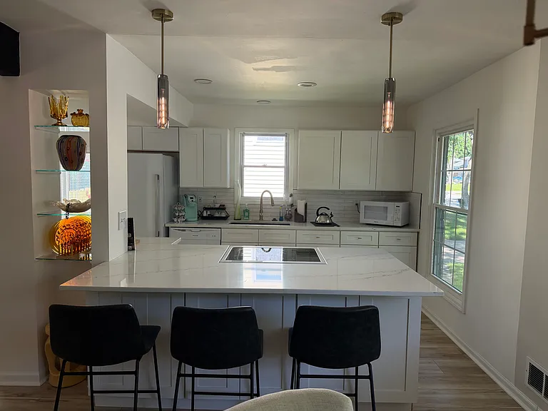 Beautifully renovated fully stocked kitchen with Large Island