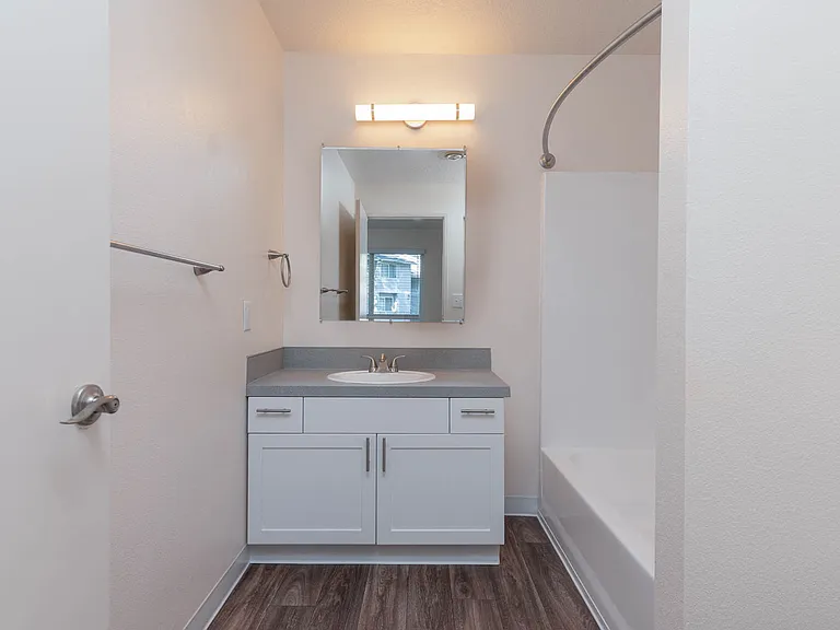 Fernwood | 1x1 Bathroom with white cabinetry