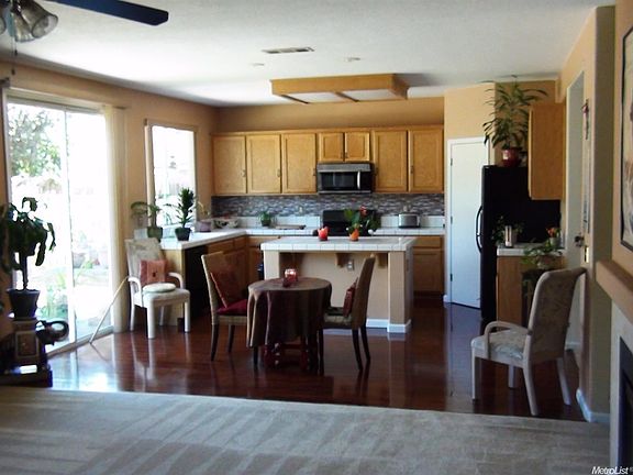 The Kitchen as seen from the Family Room has an island and opens up in the "Great Room" type of concept.