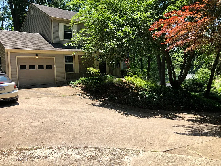 Front of house from upper drive on neighbors side