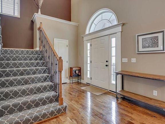 Nice Entry with designer carpet going up