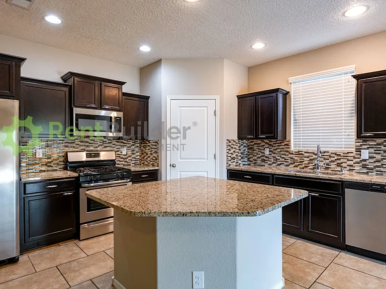 6936 Tombstone Rd NW — Photo 6