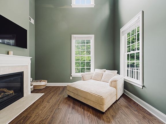 Living room with gas fireplace and new LVP flooring