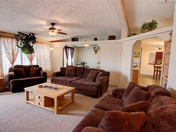 Family room leading into kitchen or dining/bar areas.
