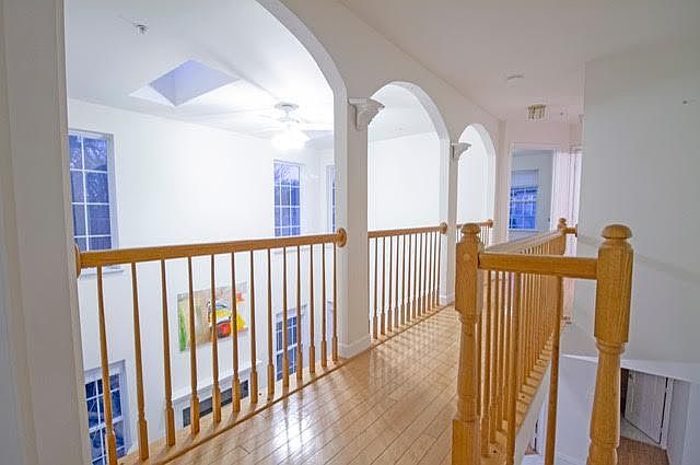 Second floor Hallway looking down at the family room