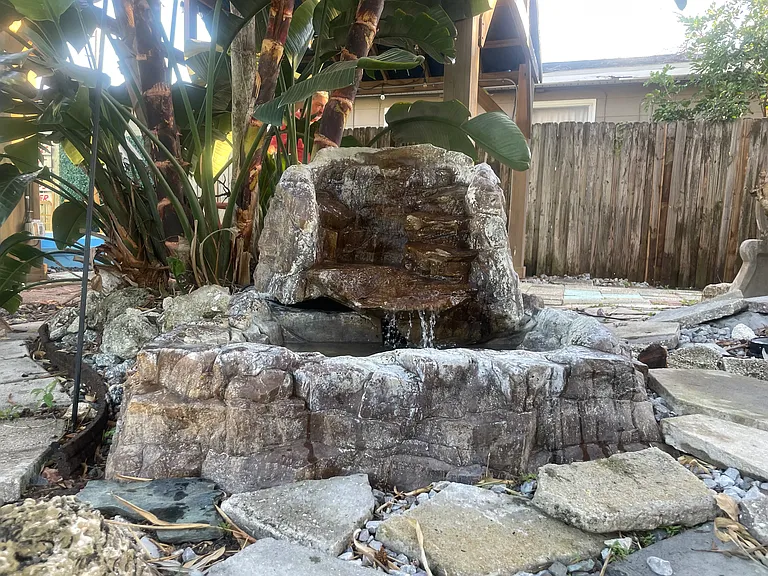 One of two working fountains in the backyard.