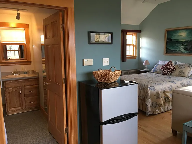 View of bathroom and sleeping area from kitchenettte