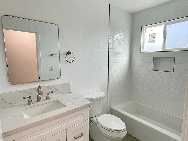 Full bathroom located inside master bedroom / rear unit