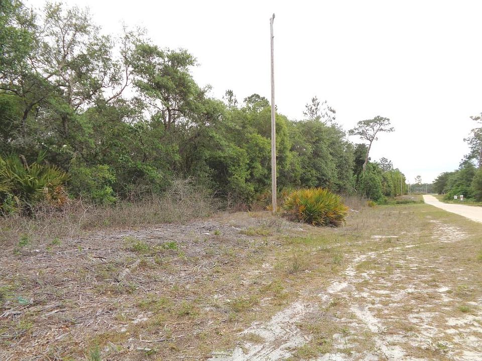 1st image of 100 Woodland Acres Ct