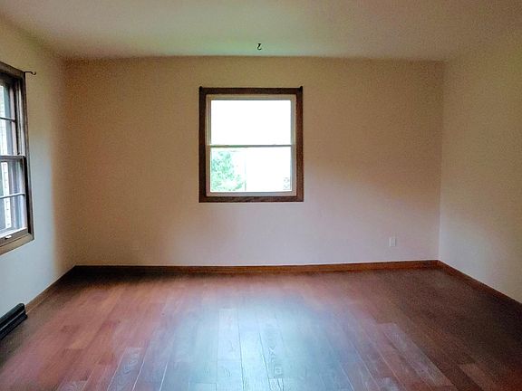 Larage Living Room with Vinyl flooring.
