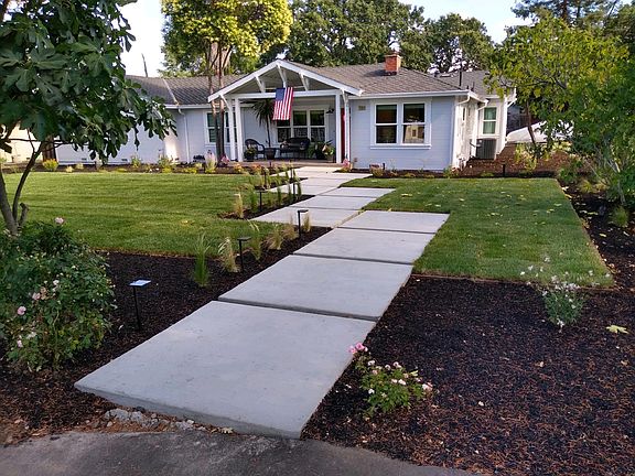Front yard at 1st Avenue and Shasta Lane. Front porch and front entrance.