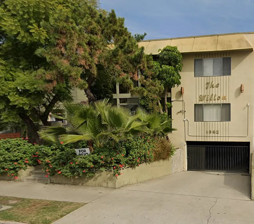 front of building; unit is top right window; gated subterranean parking garage