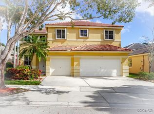 1696 Sparrow Ln, Weston, FL 33327
