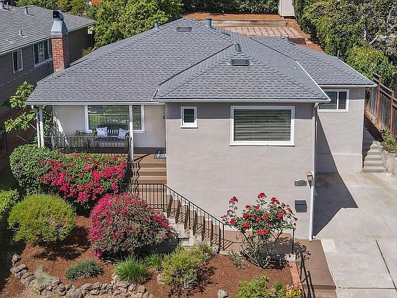 Single-story 1,480 square foot 3-bedroom 2-bath house offering open-concept spaces and a variety of modern upgrades.