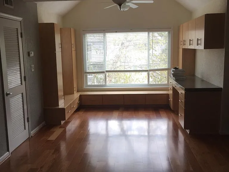 Another View...(Lots of light with windows that overlook the pool) Come have a seat and chat while you sip coffee and enjoy the sun on your built-in benches with plenty of storage!