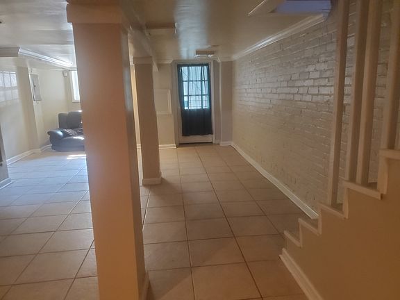 Entering in the front door.