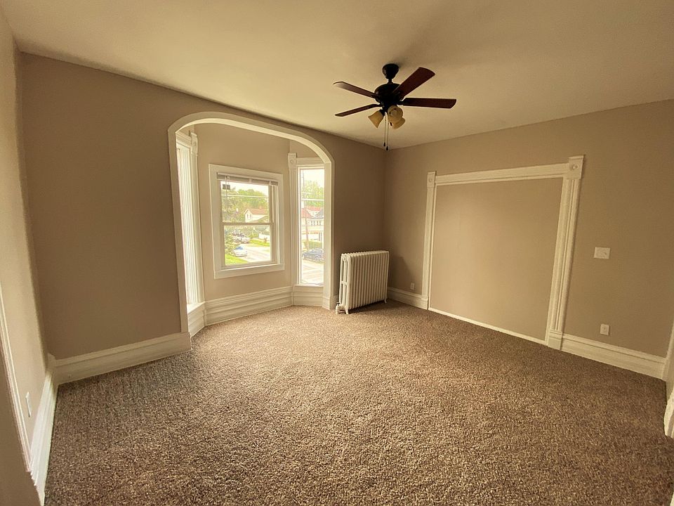 Spacious, bright living room with lovely new floors and heaps of streaming natural light!