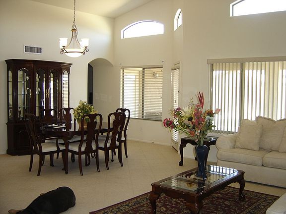 This home has a dramatic entry leading into the Formal Living 